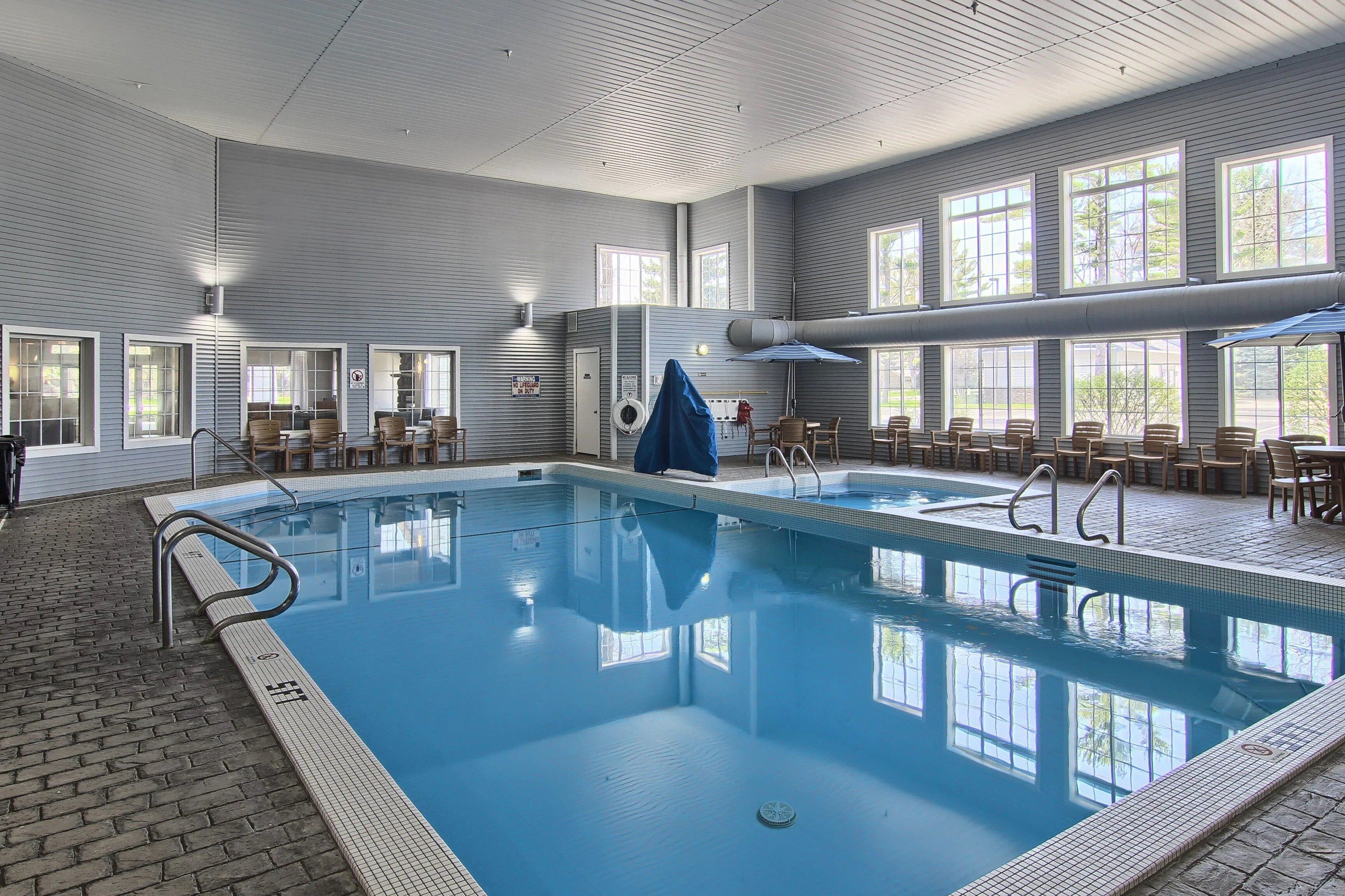 indoor pool, open 8:00 am to 11:00 pm, pool loungers