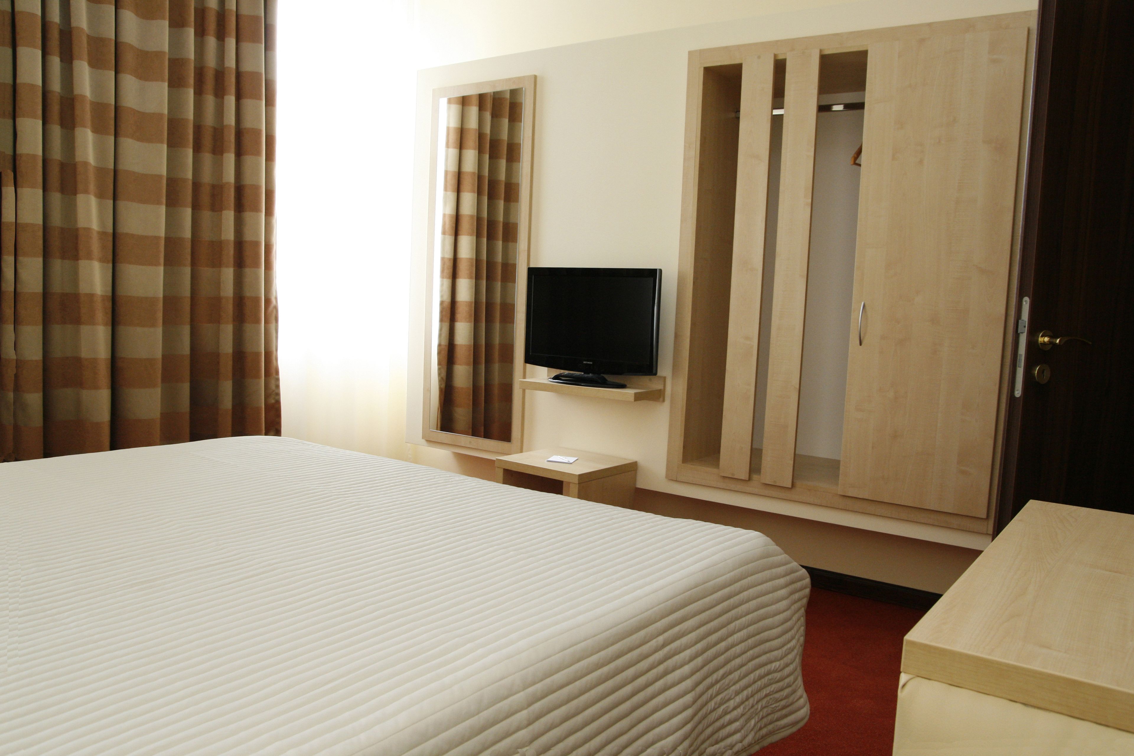 superior double room, 1 bedroom, city view | minibar, in-room safe, desk, soundproofing