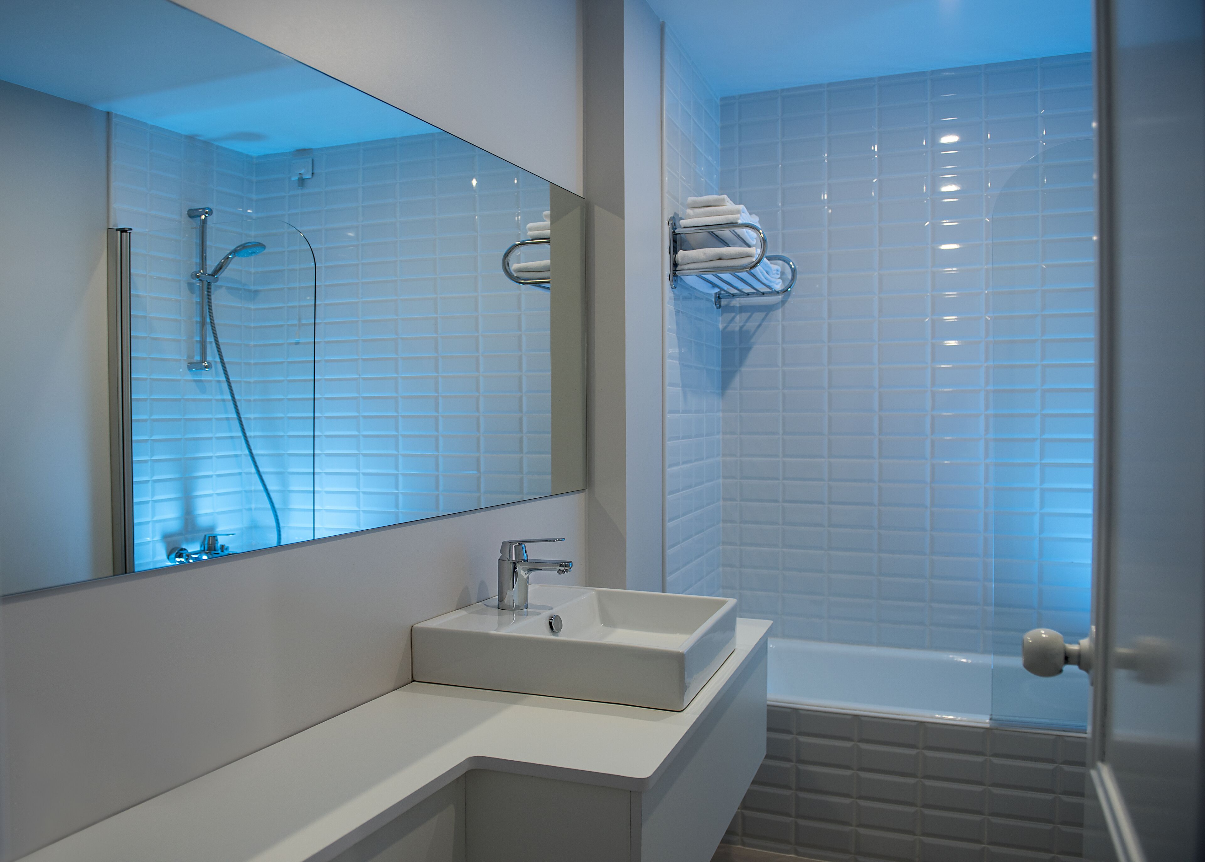 shower, hair dryer, bidet, towels