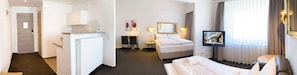 Comfort Room, 1 Queen Bed | Room amenity