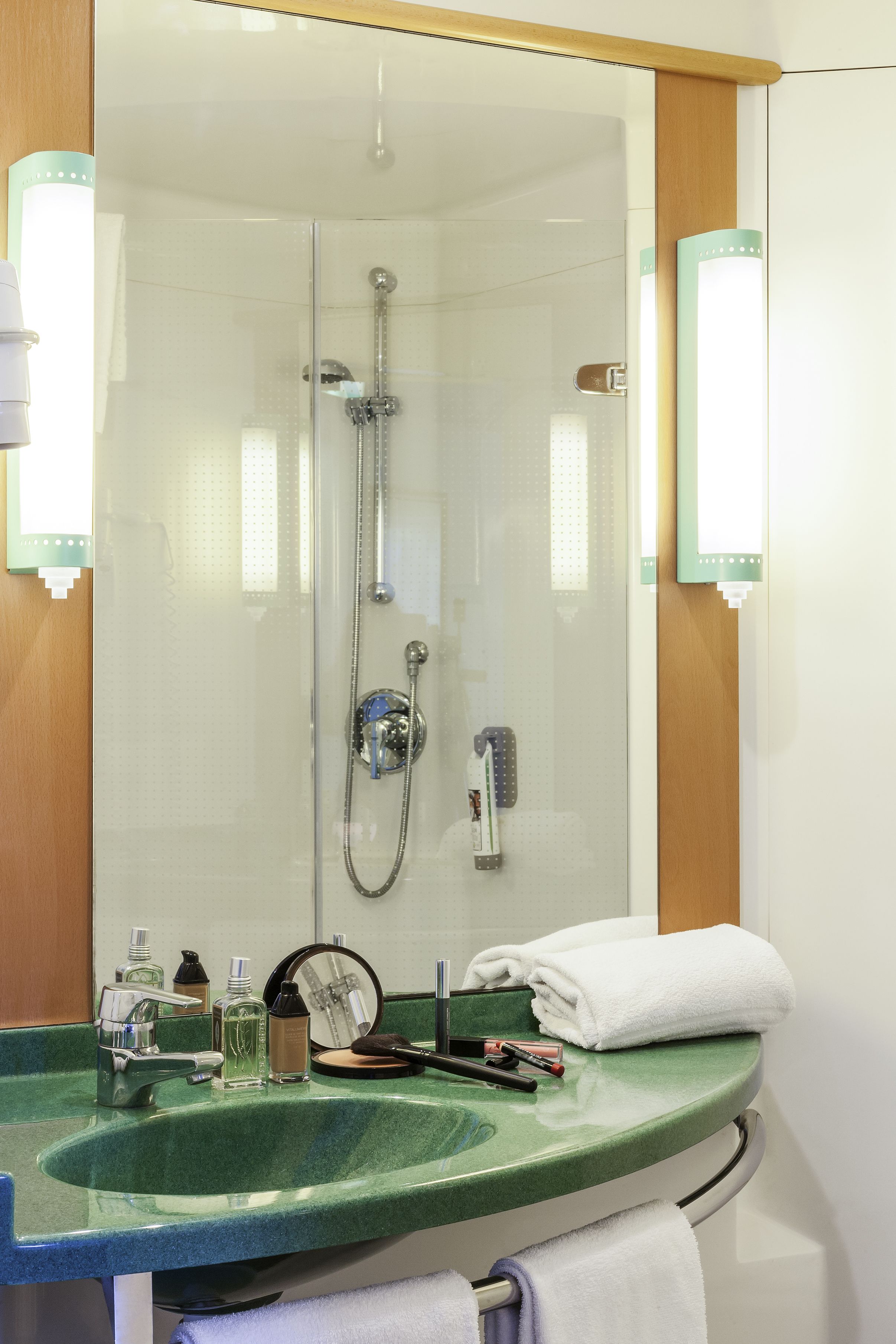 shower, eco-friendly toiletries, hair dryer, towels