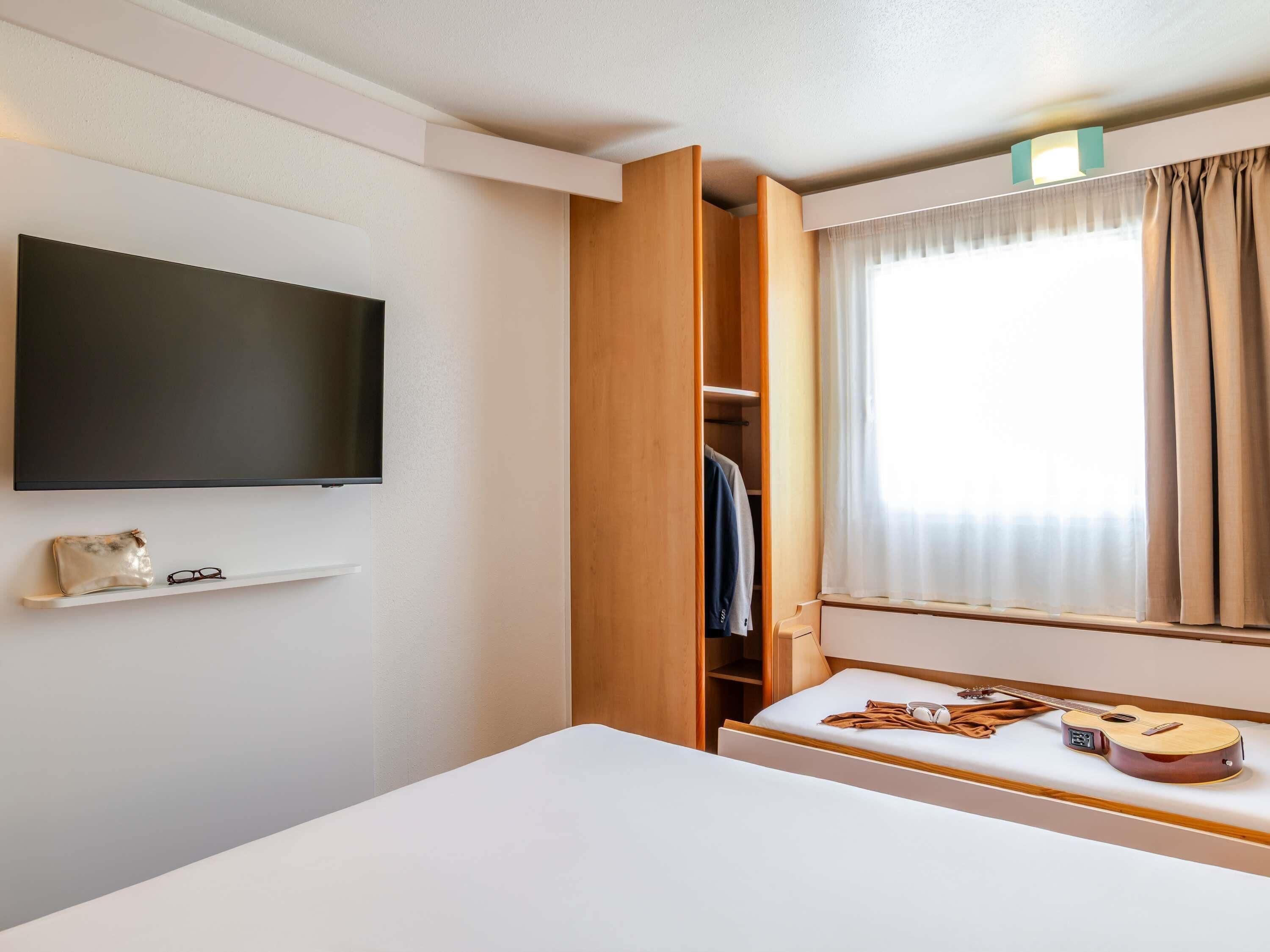 Room, Multiple Beds | In-room safe, desk, iron/ironing board, free WiFi