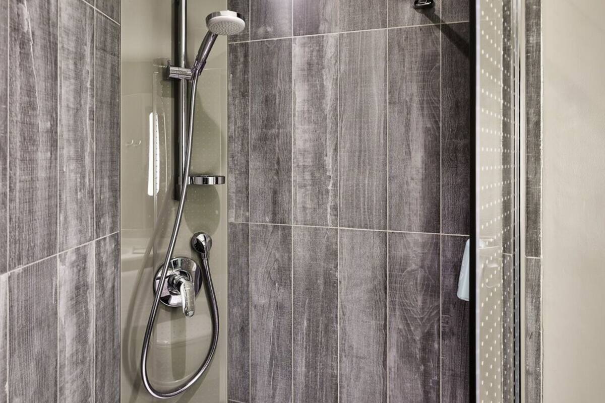 shower, eco-friendly toiletries, hair dryer, towels