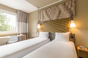 Habitación | Ropa de cama de alta calidad y caja de seguridad en la habitación 