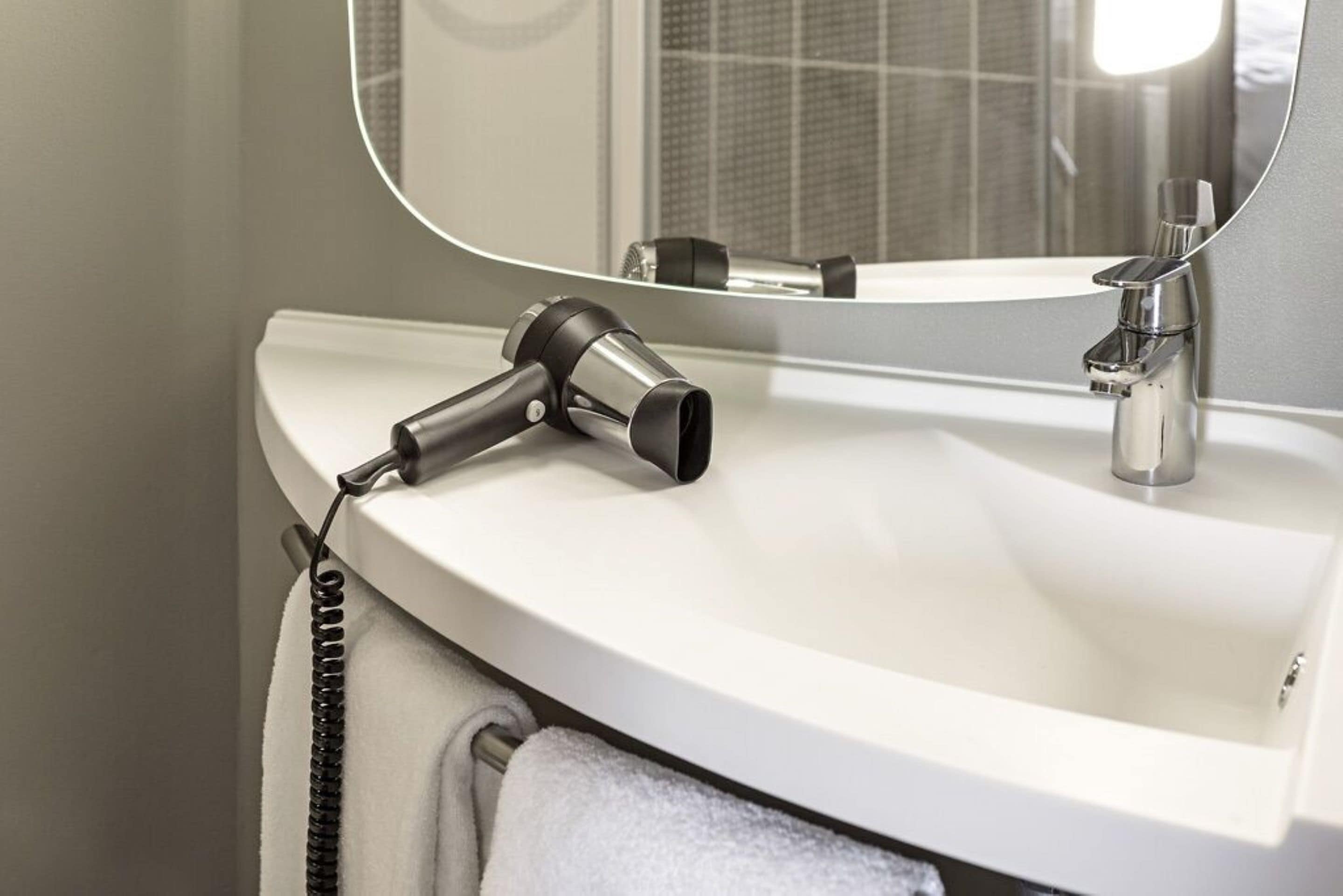 shower, eco-friendly toiletries, hair dryer, towels