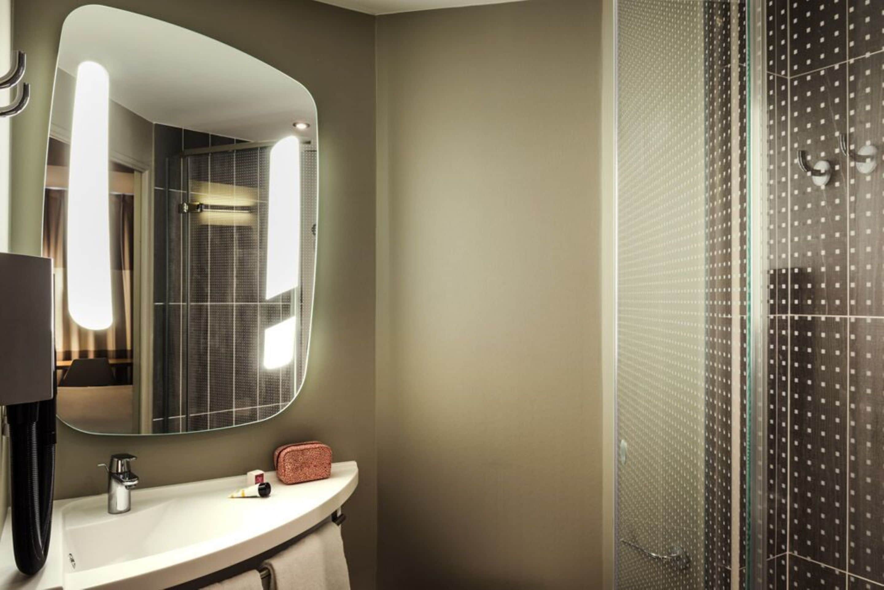 shower, eco-friendly toiletries, hair dryer, towels