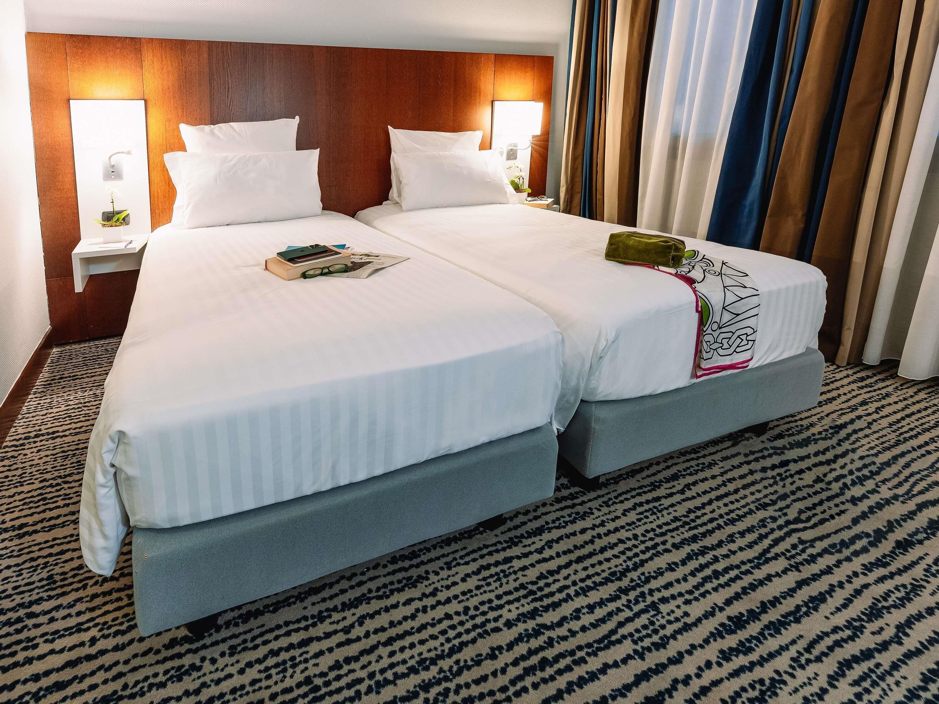 Hypo-allergenic bedding, minibar, in-room safe, desk