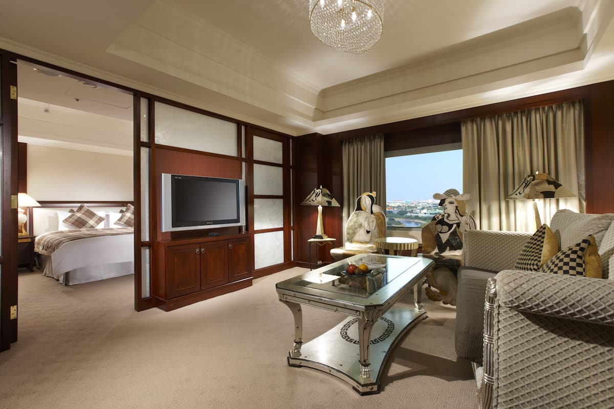 suite, 1 king bed (ambassador) | in-room safe, desk, blackout curtains, free wifi