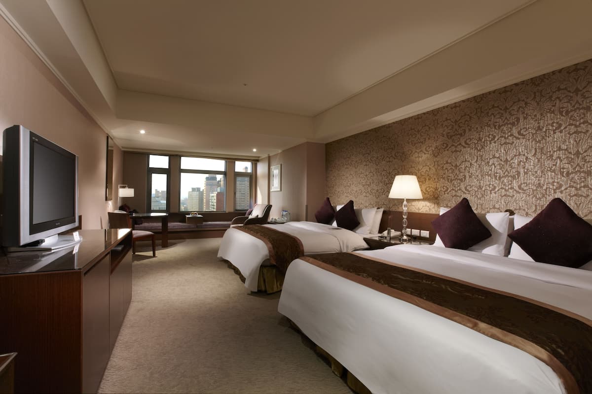 deluxe quadruple room, 2 queen beds | in-room safe, desk, blackout curtains, free wifi