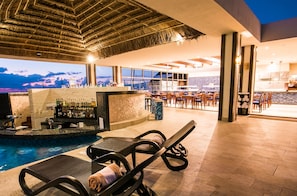 6 bars/lounges, swim-up bar, poolside bar