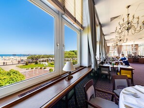 Breakfast, lunch, dinner served; beach views