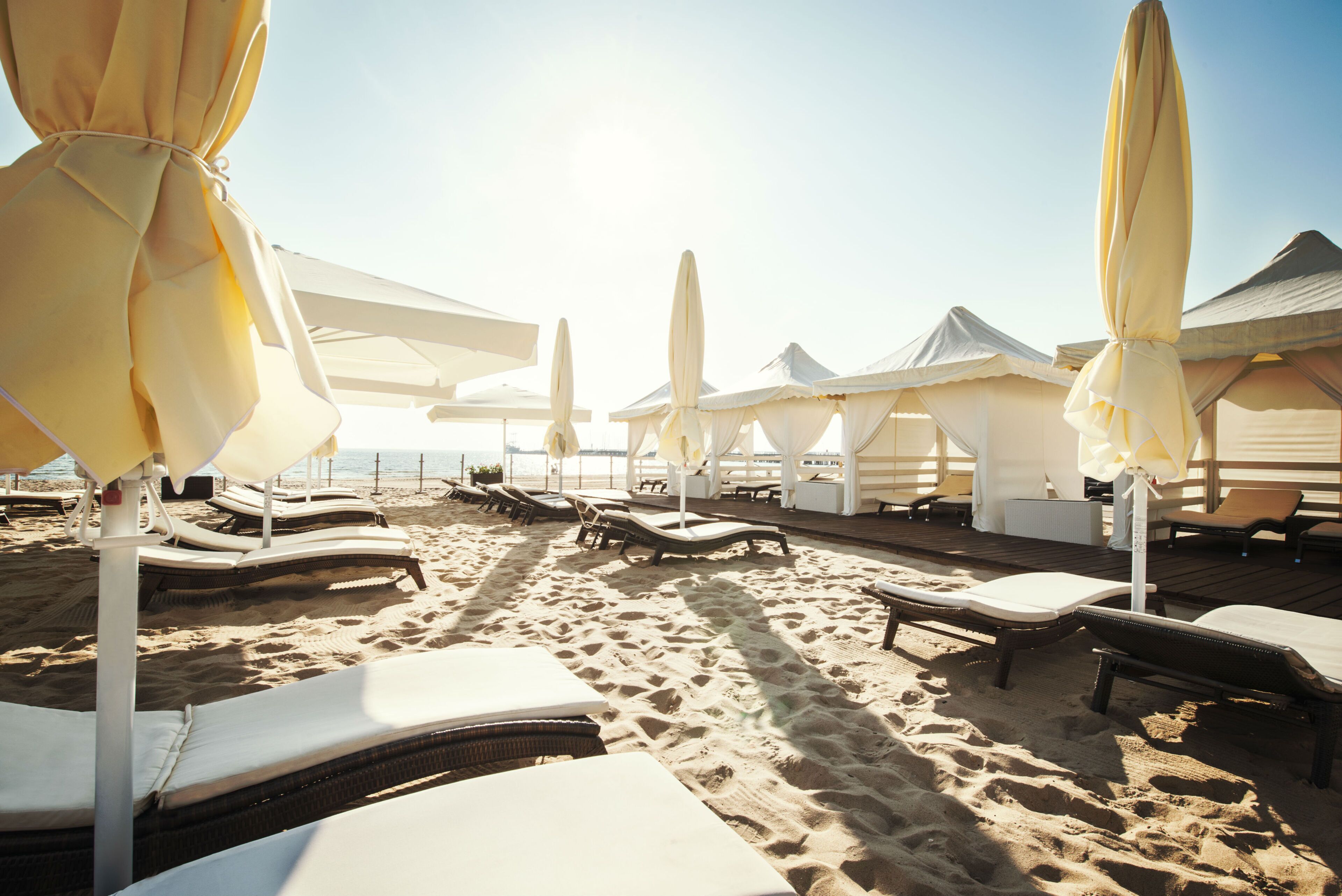 On the beach, sun-loungers, beach towels