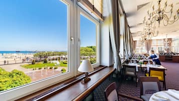 Breakfast, lunch, dinner served; beach views