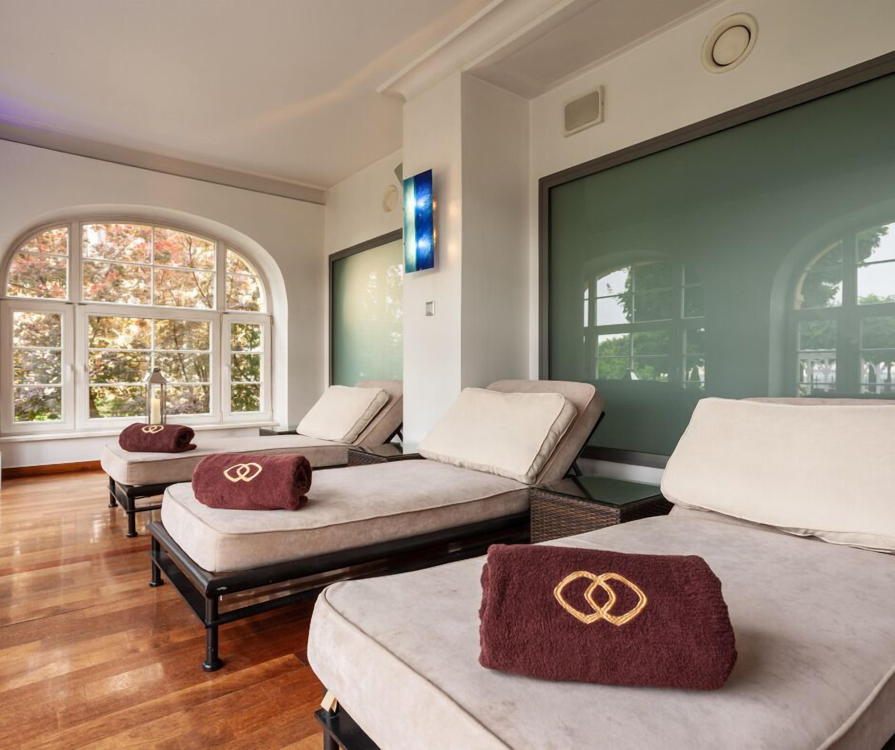 Indoor pool, open 8:00 AM to 9:00 PM, pool loungers