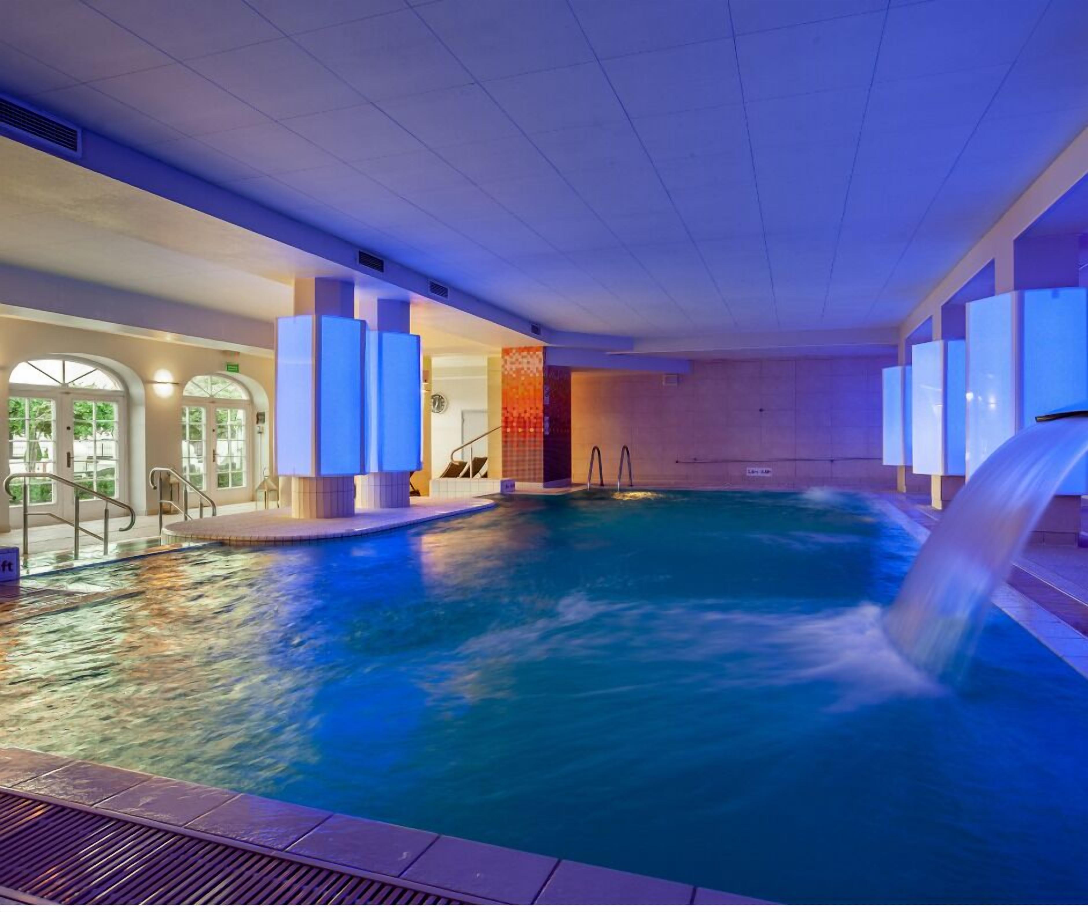 Indoor pool, open 8:00 AM to 9:00 PM, pool loungers