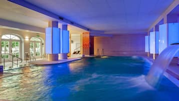 Indoor pool, open 8:00 AM to 9:00 PM, pool loungers