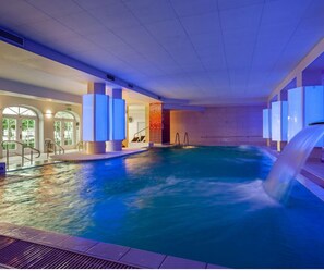 Indoor pool, open 8:00 AM to 9:00 PM, pool loungers