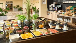 A buffet with various food items and a coffee station. - Mercure Cieszyn (Cieszyn)