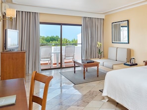 Double Room, Sea View | Living area | Flat-screen TV, stereo