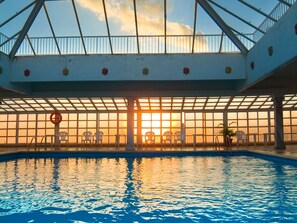 Indoor pool, sun loungers