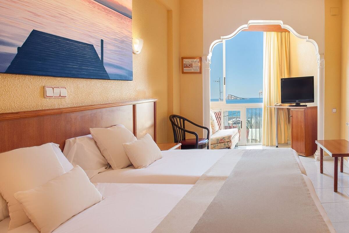 Room, Partial Sea View | Iron/ironing board (on request), cribs (surcharge), WiFi (free)