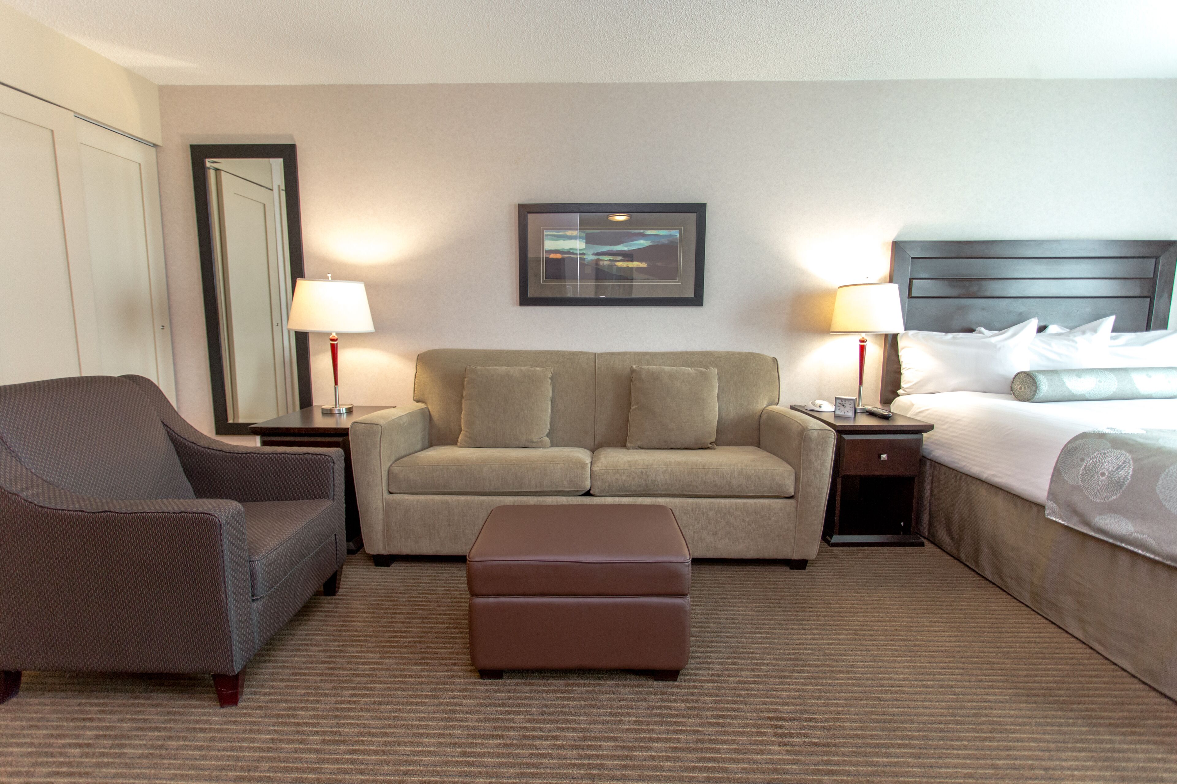 studio suite, 1 queen bed with sofa bed, kitchenette (premium studio full kitchen queen) | living area | 42-inch lcd tv with cable channels, tv, ipod dock