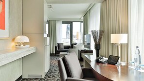 Deluxe Suite | Hypo-allergenic bedding, in-room safe, desk, laptop workspace