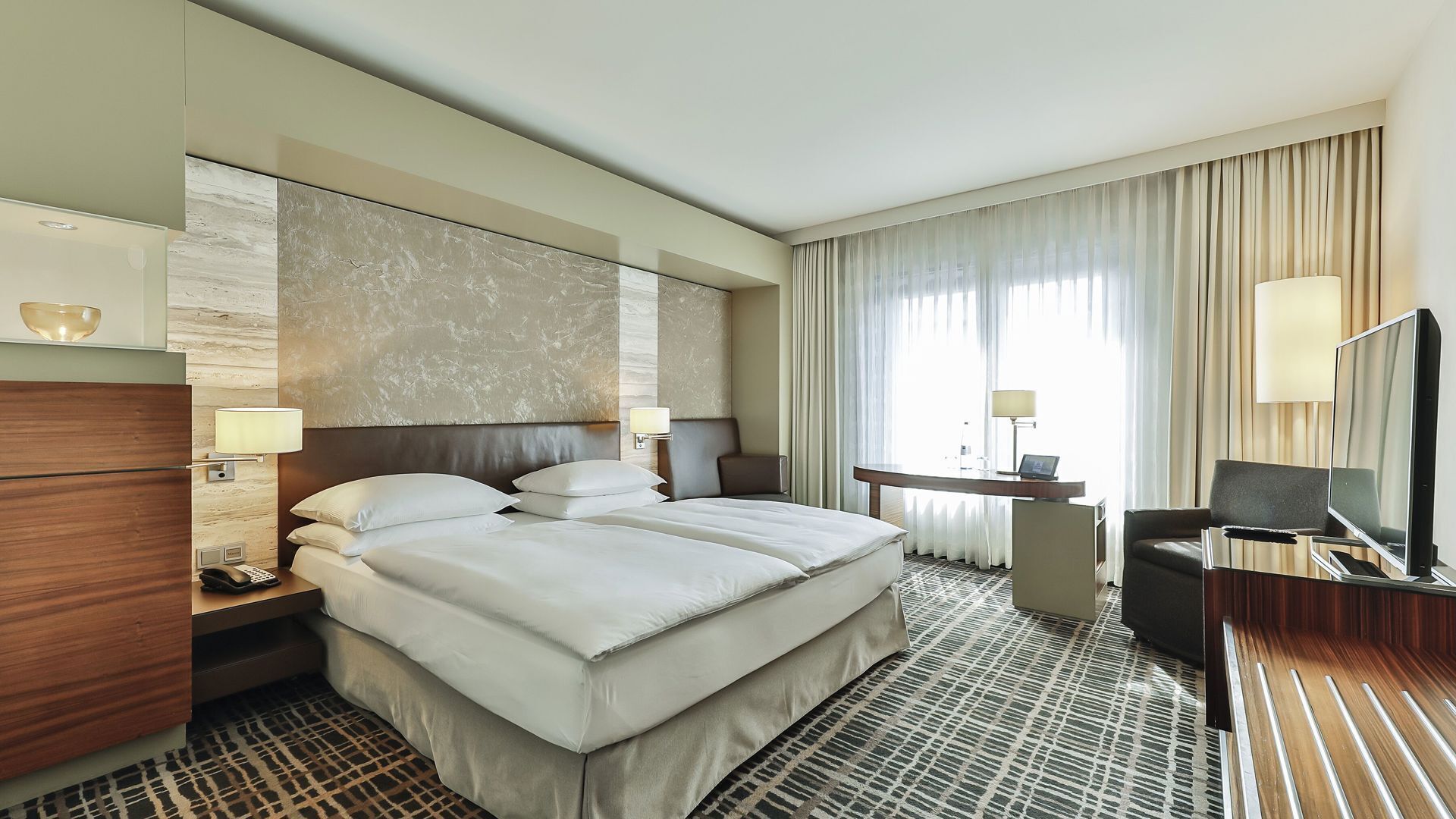 Hypo-allergenic bedding, in-room safe, desk, laptop workspace