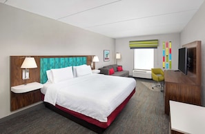 Standaard kamer | Woonruimte | Een 42-inch flatscreentelevisie met kabelzenders en televisie