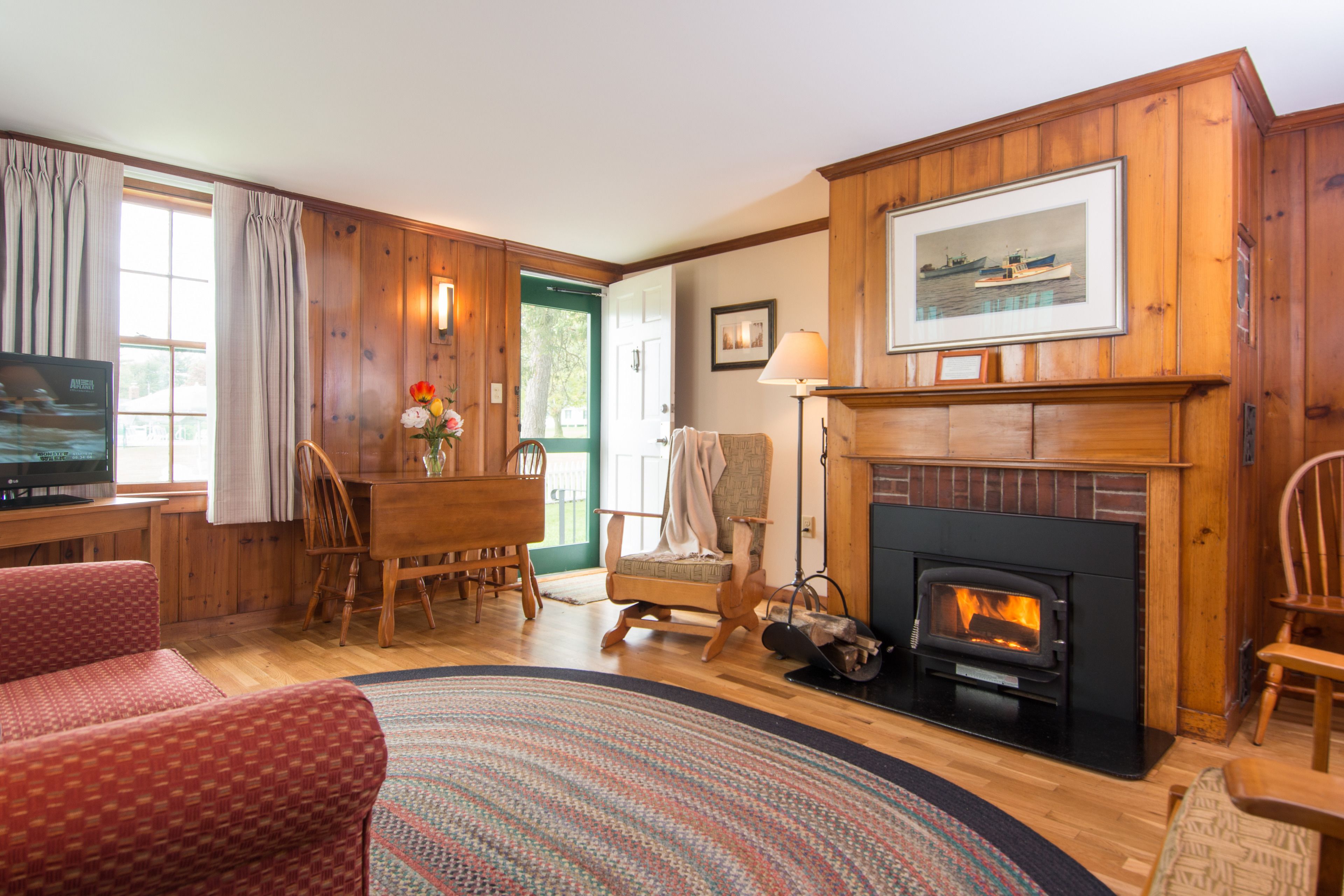 cottage (one bedroom cottage water view) | living area | flat-screen tv