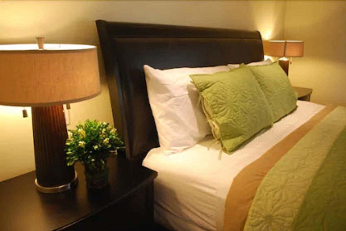 Premium bedding, blackout curtains, iron/ironing board, free WiFi