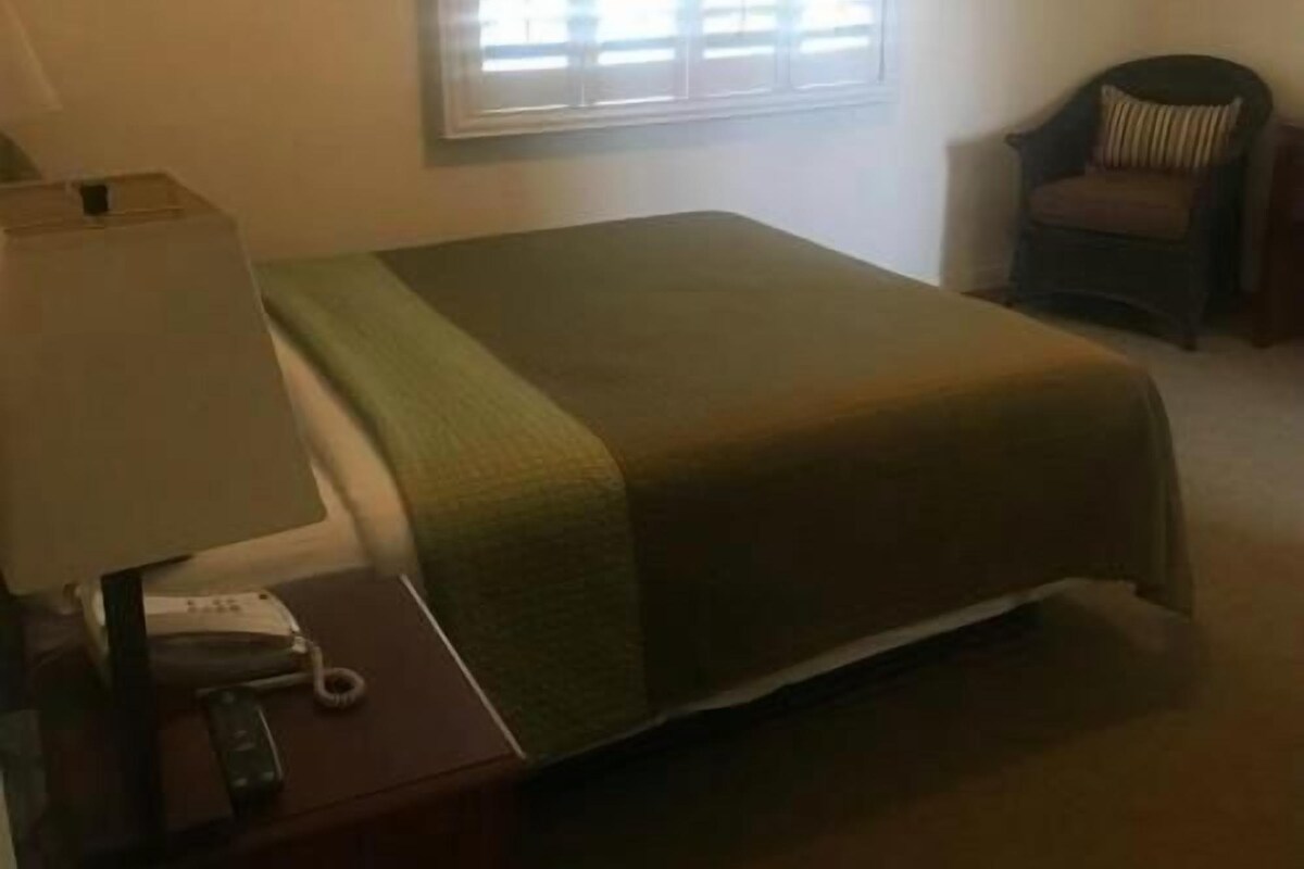 Premium bedding, blackout curtains, iron/ironing board, free WiFi