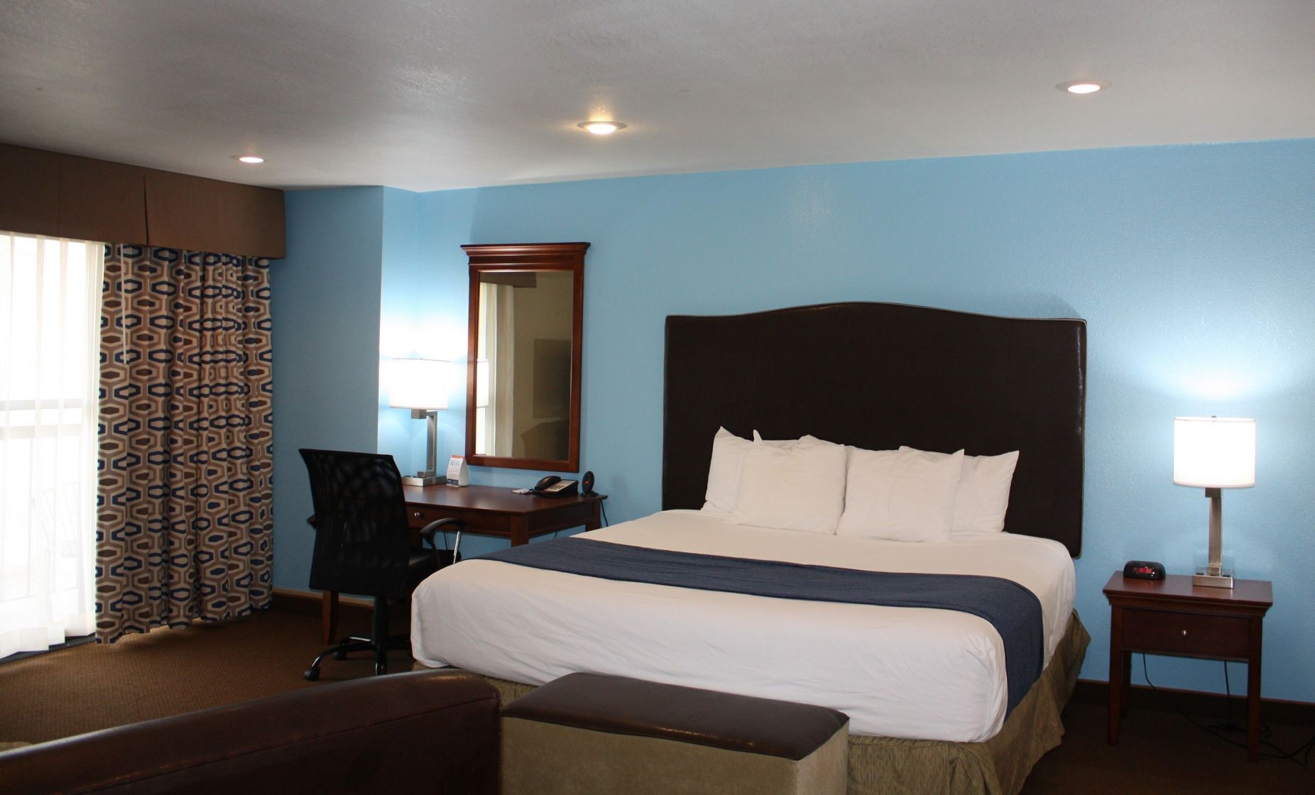 Premium bedding, desk, blackout curtains, iron/ironing board