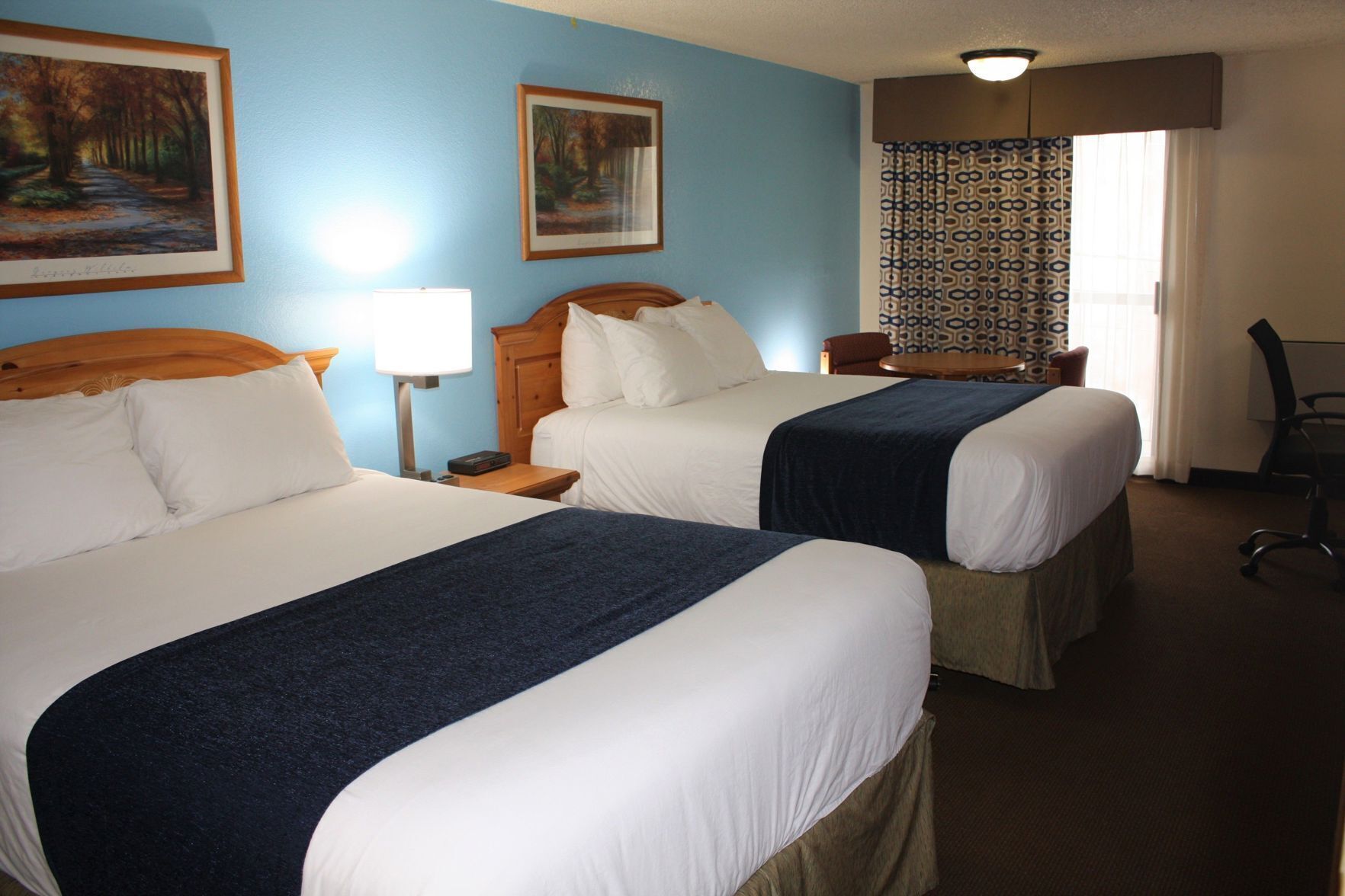 Premium bedding, desk, blackout curtains, iron/ironing board