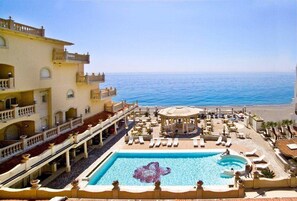 Seasonal outdoor pool, pool umbrellas, sun loungers