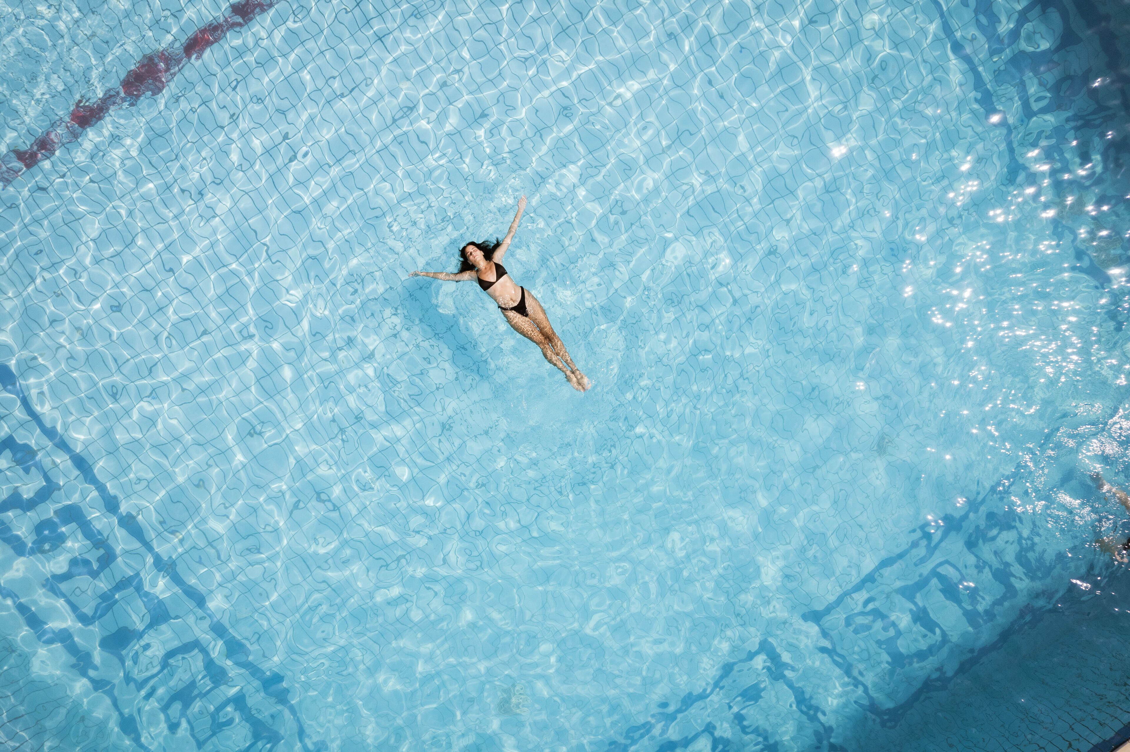Outdoor pool, open noon to 5:00 PM, pool umbrellas, sun loungers