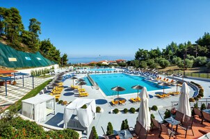 Outdoor pool, open noon to 5:00 PM, pool umbrellas, sun loungers