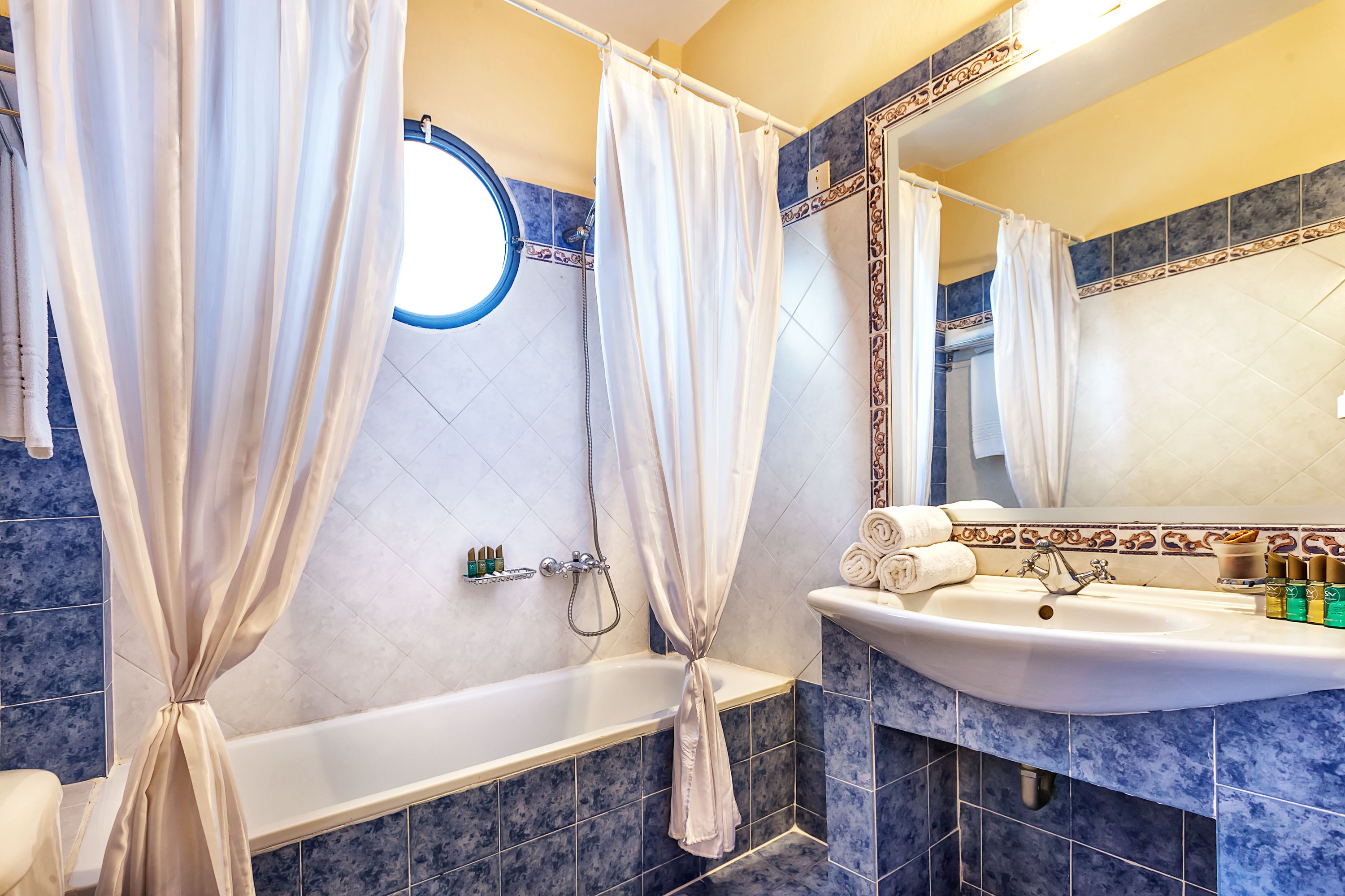 family room | bathroom | shower, hair dryer, towels