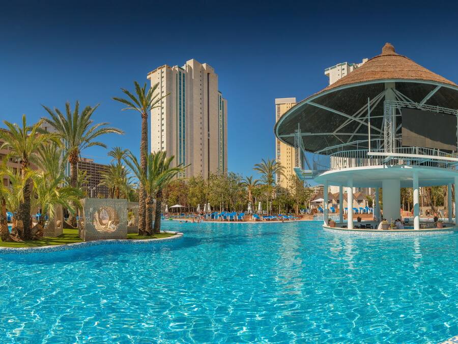 Outdoor pool, open 10 AM to 8 PM, pool umbrellas, sun loungers