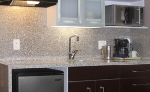 Fridge, microwave, cookware/dishes/utensils