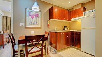Fridge, microwave, cookware/dishes/utensils