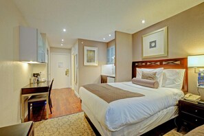 Premium bedding, pillow-top beds, desk, blackout curtains