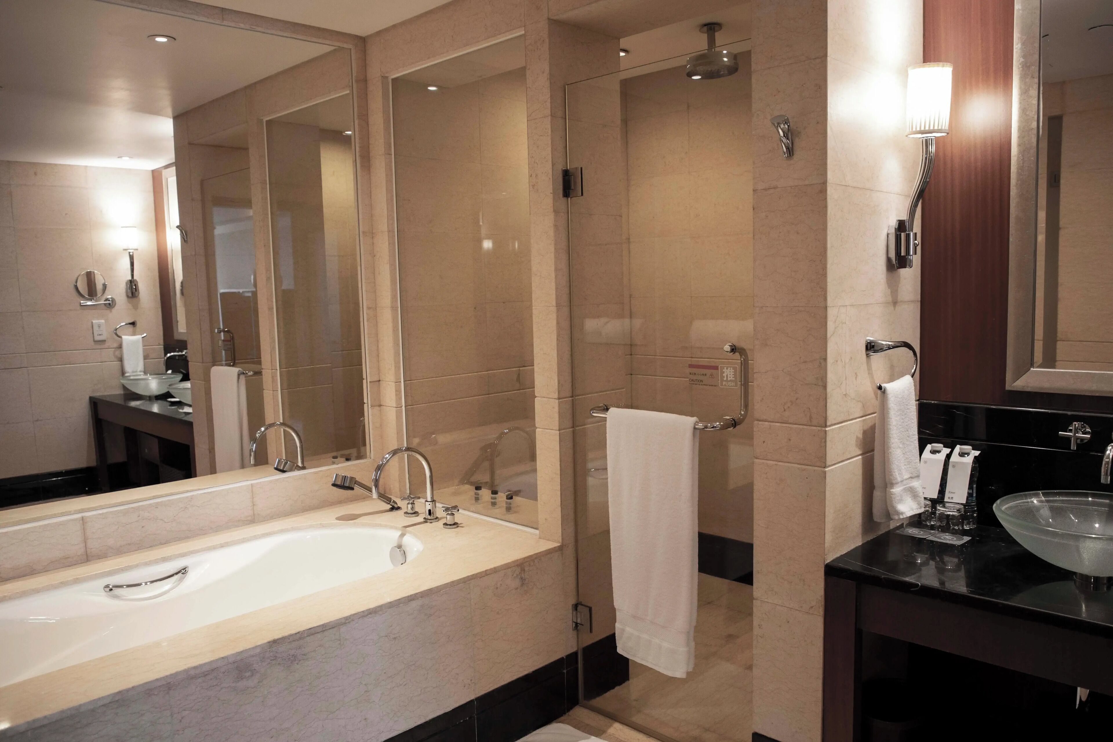 junior suite, 1 bedroom | bathroom | separate bathtub and shower, deep-soaking bathtub, free toiletries
