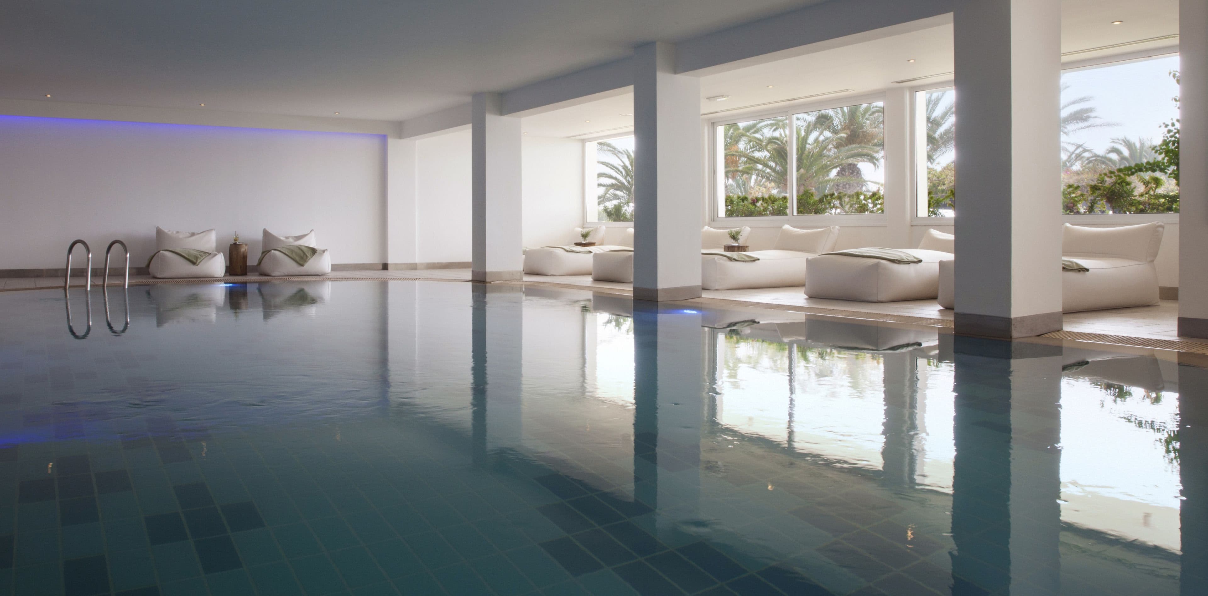 indoor pool, outdoor pool, pool umbrellas