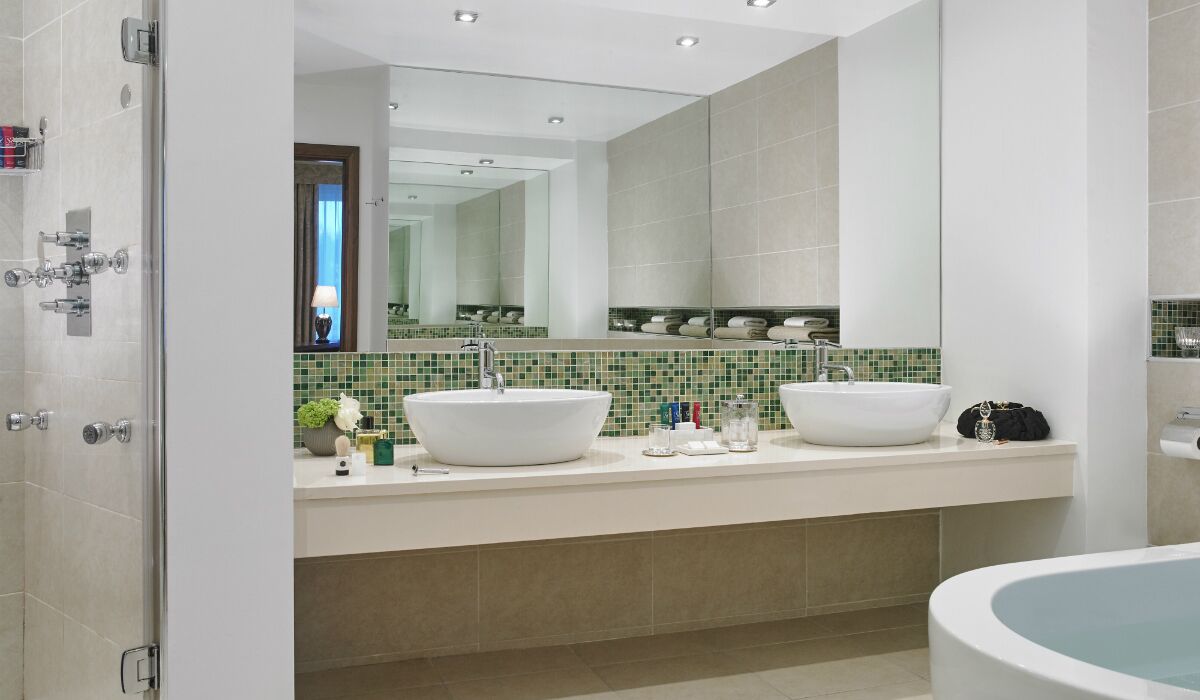 classic suite | bathroom | designer toiletries, hair dryer, towels, soap