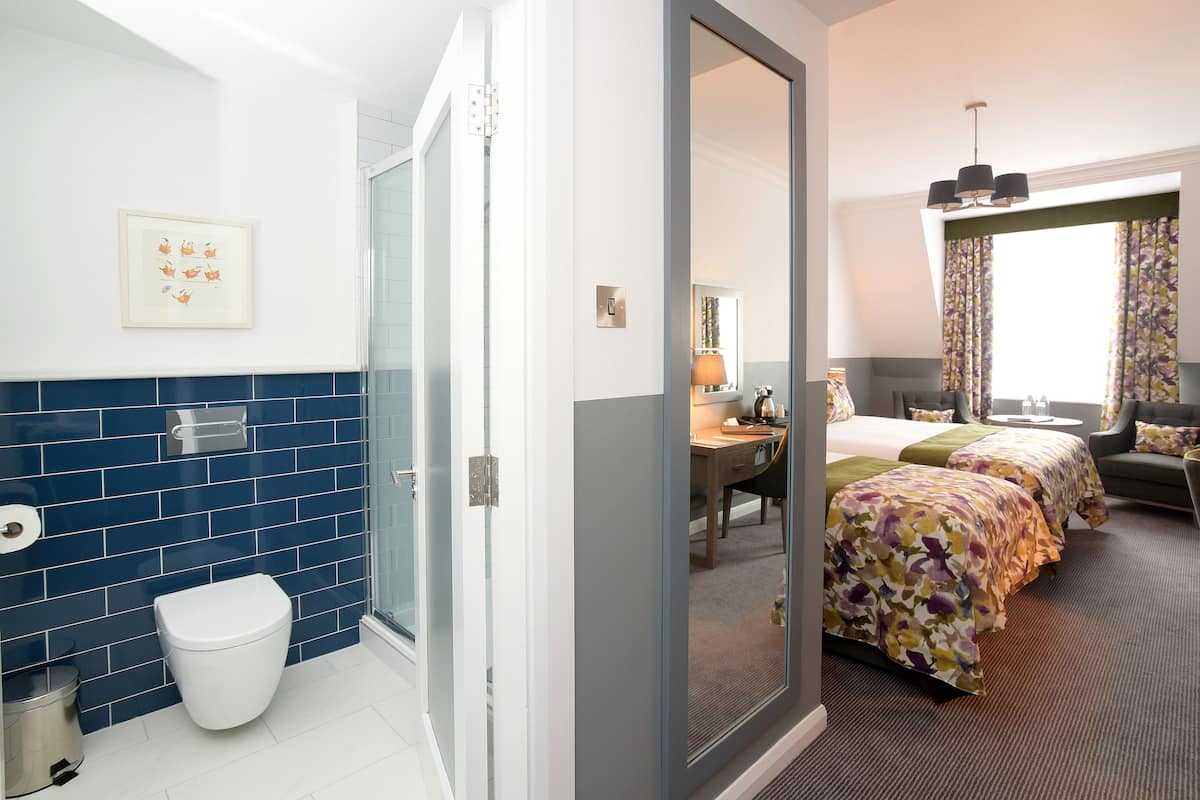 Designer toiletries, hair dryer, towels, soap