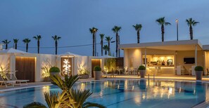 Seasonal outdoor pool, pool umbrellas, sun loungers