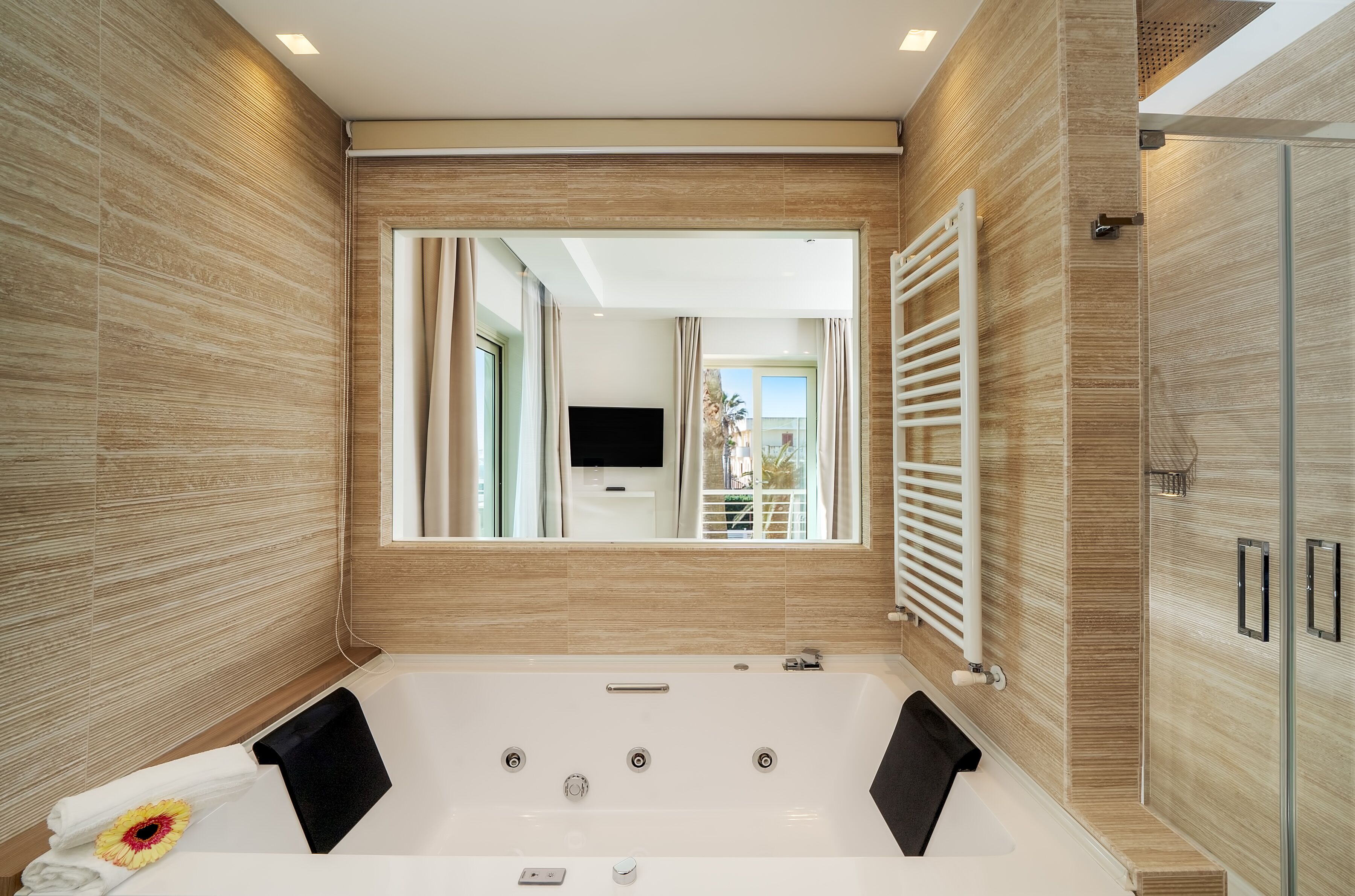 shower, hair dryer, bidet, towels