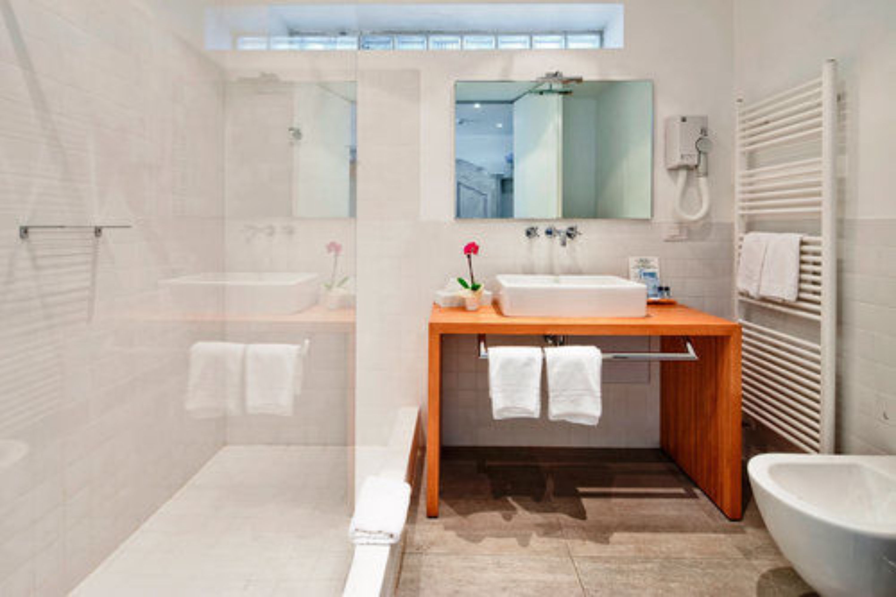 deluxe double room, private pati on the lake in villa, no lift | bathroom | hair dryer, slippers, towels, soap