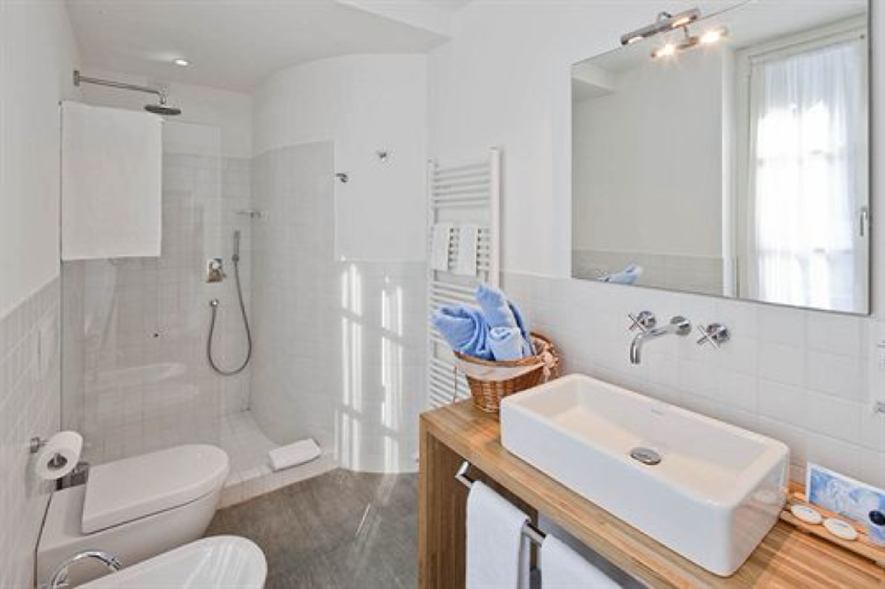 hair dryer, slippers, towels, soap